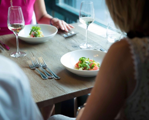 Table with dishes and diners